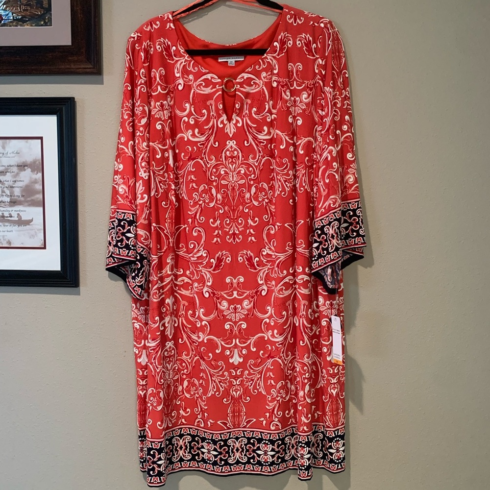 Sandra Darren red and black dress with flared sleeves.